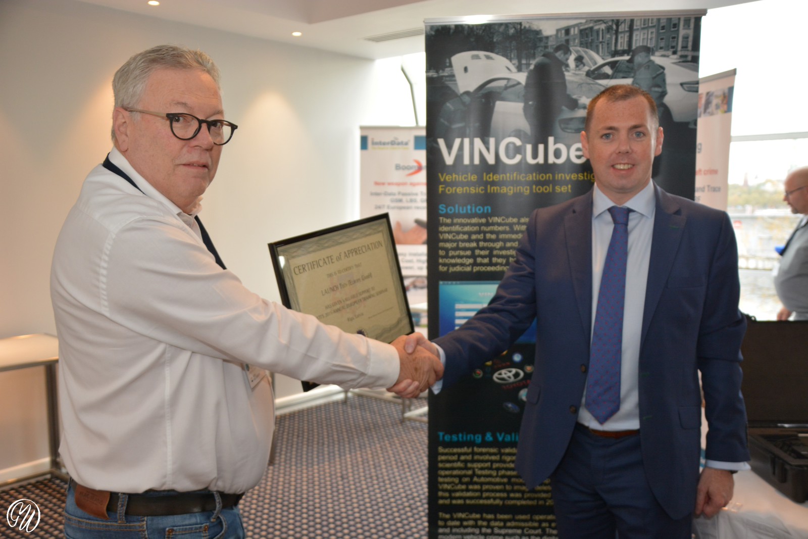 Mr Coyne receives award from IAATI